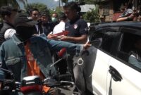 1762191957020-rekonstruksi-tersangka-darussalam-menembak-korban-di-jalan-poros-sumarrang-desa-lagi-agi-kecamatan-campalagian-polman-1762178731899_169