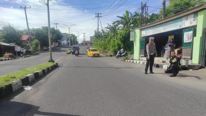 1763120718232-polisi-olah-tkp-kecelakaan-bus-bintang-zahira-di-parepare-1763099534971_169