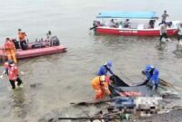 1763206676530-tim-sar-gabungan-mengevakuasi-mayat-tanpa-identitas-di-pulau-lae-lae-1763190816568_169