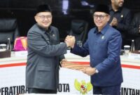 1763444866347-wali-kota-makassar-munafri-arifuddin-bersama-ketua-dprd-makassar-supratman-menandatangani-kua-ppas-apbd-2026-1763431475678_169