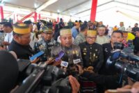 1763463997561-gubernur-sulsel-andi-sudirman-sulaiman-saat-menghadiri-hut-ke-705-gowa-1763453209794_169