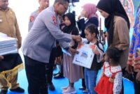 1765343231683-penyerahan-bantuan-tabungan-pendidikan-kepada-anak-anggota-polri-yang-gugur-dibunuh-kkb-papua-1765327049691_169