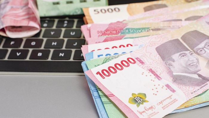 1765537593511-ilustrasi-uang_169