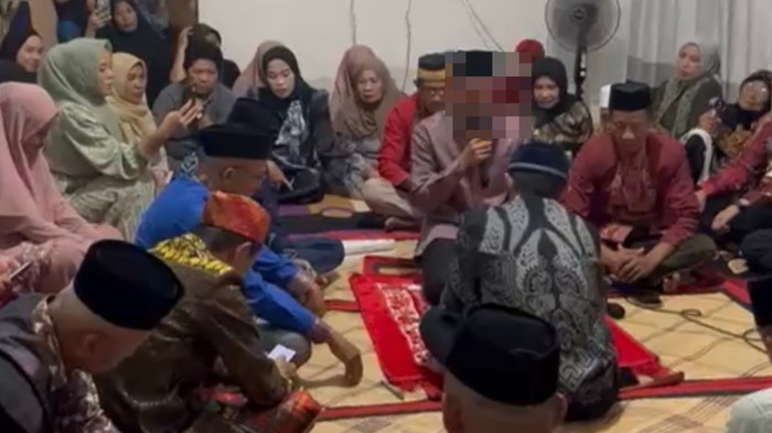 1767978376948-suami-nim-inisial-aw-saat-melangsungkan-pernikahan-dengan-wanita-lain-berinisial-irh-di-bulan-oktober-2025-1767969858174_169