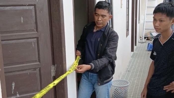 1769101651406-polisi-melakukan-olah-tkp-di-lokasi-penemuan-mayat-di-sebuah-kost-di-makassar-1769088300110_169
